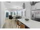 Open-concept living area showcases a kitchen, dining area, and living room with stylish decor and ample space at 1534 Millrock Trl, Wendell, NC 27591