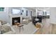 Spacious living area featuring a fireplace, comfortable seating, and stylish decor for relaxation and entertainment at 1534 Millrock Trl, Wendell, NC 27591