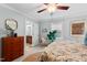 Comfortable bedroom with a view into an attached bathroom, offering both convenience and a cozy atmosphere at 1826 Northgate St, Durham, NC 27704