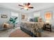Inviting bedroom with a large bed, leafy green plants, and natural light to create a relaxing atmosphere at 1826 Northgate St, Durham, NC 27704