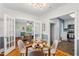 Dining area adjacent to the kitchen and living room, offering seamless entertaining space at 1826 Northgate St, Durham, NC 27704