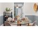 Bright dining area with a round glass-top table and seating for four at 1826 Northgate St, Durham, NC 27704
