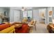 Inviting living room with cozy seating, natural light, and a backgammon coffee table, perfect for relaxing and entertaining at 1826 Northgate St, Durham, NC 27704