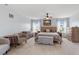 Spacious primary bedroom featuring a ceiling fan and lots of natural light at 209 Sage Oak Ln, Holly Springs, NC 27540