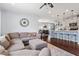 Open-concept living area connects to the kitchen and dining room, with comfortable seating at 209 Sage Oak Ln, Holly Springs, NC 27540