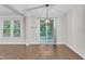 Cozy dining room offers natural light and access to the backyard patio at 216 Pondside Dr, Apex, NC 27539