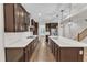 Stylish kitchen with a large island, stainless appliances, and custom cabinets at 216 Pondside Dr, Apex, NC 27539