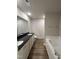 Modern bathroom with dual sinks, granite countertops, and a soaking tub at 233 Constellation Ct, Benson, NC 27504