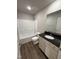 Bathroom with shower-tub, modern vanity, and fixtures at 233 Constellation Ct, Benson, NC 27504