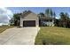 Charming single-Gathering home with a front porch and an attached two-car garage at 233 Constellation Ct, Benson, NC 27504