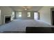 Spacious living room featuring plush carpeting, a fireplace, and plenty of natural light at 233 Constellation Ct, Benson, NC 27504