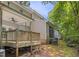 Back deck view showing the spacious layout, roof, and access to the home and yard at 2623 Broad Oaks Pl, Raleigh, NC 27603