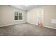 Spacious bedroom featuring a large window for natural light and neutral walls at 2623 Broad Oaks Pl, Raleigh, NC 27603