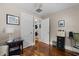 Bedroom with laundry and storage through the doors features hardwood floors, and neutral paint at 2710 Broad St, Durham, NC 27704