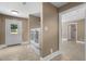 Bright laundry room with tiled floors, washer and dryer, and access to the backyard at 2712 Broad St, Durham, NC 27704