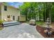 Backyard with water fountain, grill and patio at 2721 Rustic Brick Rd, Raleigh, NC 27603