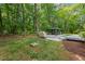 Large backyard with gazebo, patio, and grill, offering ample space for outdoor entertainment and relaxation at 2721 Rustic Brick Rd, Raleigh, NC 27603