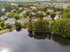 Homes backing onto a lake provide beautiful views, access to recreation, and serene backyards at 3004 Montville Valley Ct, Cary, NC 27519