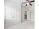 Bedroom featuring a ceiling fan and a double door closet at 3004 Montville Valley Ct, Cary, NC 27519