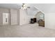 Spacious bonus room with neutral carpeting, a ceiling fan, and plenty of natural light at 3004 Montville Valley Ct, Cary, NC 27519