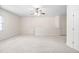 Large bonus room offers a versatile space with neutral carpet and ample natural light at 3004 Montville Valley Ct, Cary, NC 27519