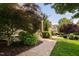 Beautiful home featuring a stone facade, welcoming porch, and manicured landscaping at 3004 Montville Valley Ct, Cary, NC 27519