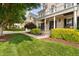 Elegant home featuring a stone facade, welcoming porch, and manicured landscaping at 3004 Montville Valley Ct, Cary, NC 27519