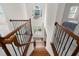 Grand foyer with high ceilings, chandelier, and staircase with wood and iron railing at 3004 Montville Valley Ct, Cary, NC 27519