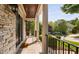 Covered front porch featuring stone, columns and pavers at 3004 Montville Valley Ct, Cary, NC 27519