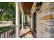 Covered front porch featuring stone, columns and pavers at 3004 Montville Valley Ct, Cary, NC 27519