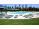 Community pool with lounge chairs and covered areas for relaxation at 3004 Montville Valley Ct, Cary, NC 27519
