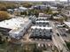 Aerial view shows a new townhome development with modern design, multiple units, and various stages of completion at 3007 Corbell Rd, Durham, NC 27701