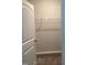 View into a closet with white wire shelving for optimal storage at 305 Theys Mill, Fuquay Varina, NC 27526