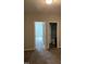 Hallway view highlighting access to bedroom and bathroom at 305 Theys Mill, Fuquay Varina, NC 27526
