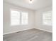 Bedroom features fresh paint, recessed lighting, and lots of windows for natural light at 308 Caswell St, Burlington, NC 27217