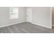 Bedroom features fresh paint, recessed lighting, and lots of windows for natural light at 308 Caswell St, Burlington, NC 27217