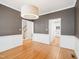 Open dining room with hardwood floors and neutral paint colors at 3303 Glen Currin Dr, Raleigh, NC 27612