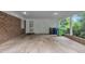 Spacious carport features an exterior door and access to additional storage at 3304 Redbud Ln, Raleigh, NC 27607