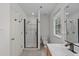 Bathroom with a glass-enclosed shower, toilet, and vanity with sink at 3330 Nantuckett Ave, Durham, NC 27703