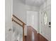 Bright foyer with hardwood floors leading to the staircase and other rooms in the house at 3330 Nantuckett Ave, Durham, NC 27703
