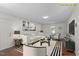 Staged living room with modern furniture, art, and decor with great lighting at 3330 Nantuckett Ave, Durham, NC 27703