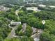 Aerial view showcasing the home's location near Lake Boone Trail and I-440, surrounded by lush greenery at 3416 Ocotea St, Raleigh, NC 27607