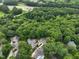 Aerial shot of lush neighborhood with mature trees, beautiful landscaping and convenient highway access at 3416 Ocotea St, Raleigh, NC 27607