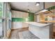 Bright kitchen featuring white cabinets and countertops at 3416 Ocotea St, Raleigh, NC 27607