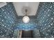 Powder room featuring unique blue and white patterned wallpaper at 3416 Ocotea St, Raleigh, NC 27607