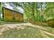 Backyard featuring wooded area and fenced in yard at 36 Birnamwood Dr, Chapel Hill, NC 27516