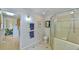 Spacious bathroom featuring shower, toilet, and walk-in closet at 36 Birnamwood Dr, Chapel Hill, NC 27516