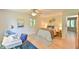 Cozy bedroom with a ceiling fan, hardwood floors, and decorative accents at 36 Birnamwood Dr, Chapel Hill, NC 27516