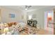 Comfortable bedroom with vibrant rug, toys, and a ceiling fan; ideal for children or guests at 36 Birnamwood Dr, Chapel Hill, NC 27516