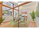 Bright dining space with wooden beams, providing a harmonious blend of architecture and comfort at 36 Birnamwood Dr, Chapel Hill, NC 27516